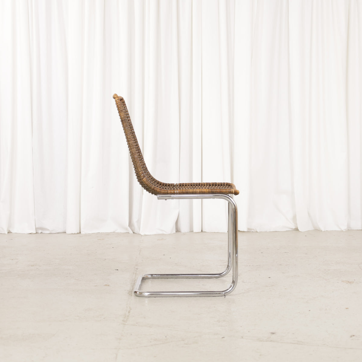 Vintage Italian Chrome and Rattan Cantilever Chair, vintage Italian chrome and rattan chair, opposite side profile