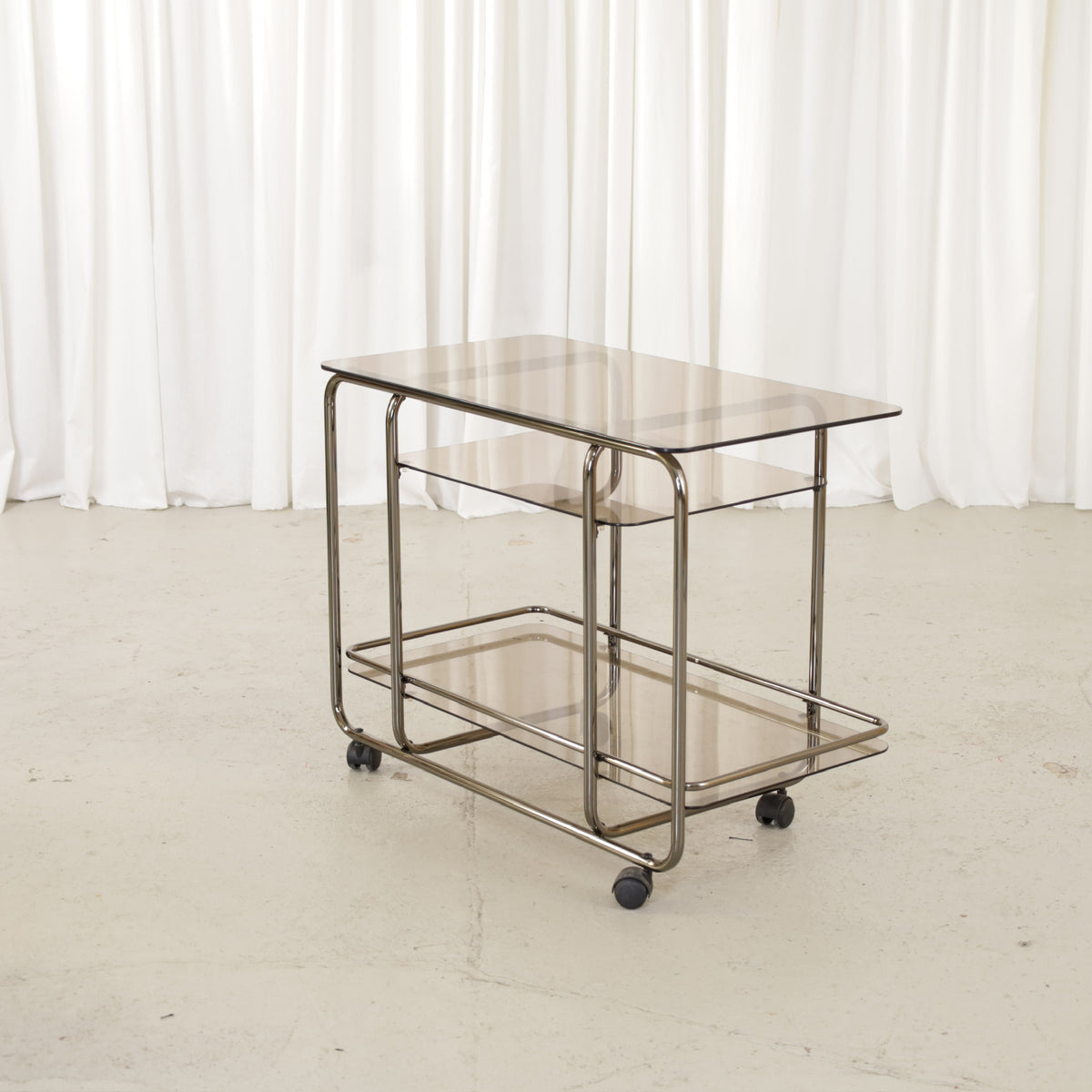 Vintage Italian-Style Chrome and Smoked Glass Serving Trolley, vintage chrome and smoked glass serving trolley, opposite three-quarter view