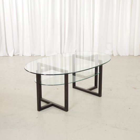 Vintage Italian-Style Oval Glass Coffee Table with Black Wooden Frame, vintage oval coffee table with black wooden frame and two clear glass tiers