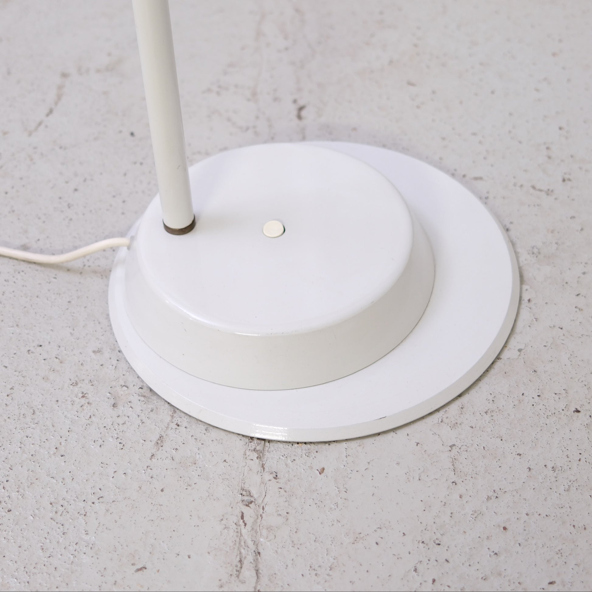 White painted metal base with light vintage wear