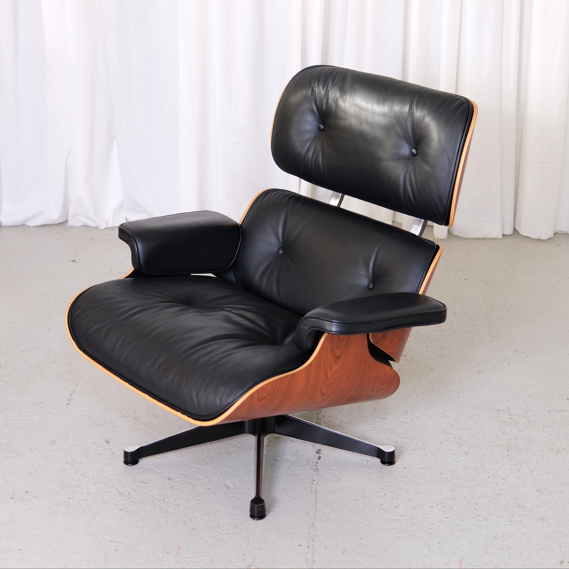Vitra Eames Lounge Chair upholstered in black Premium F leather