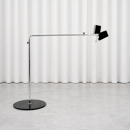 Full view of the black and chrome Yrjö Kukkapuro 100 G floor lamp