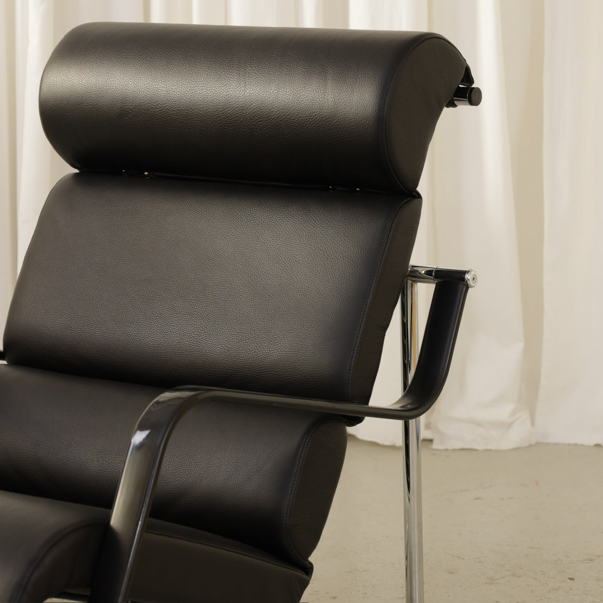 Yrjö Kukkapuro Remmi Lounge Chair with New Black Leather Cover, remmi lounge chair with new black leather upholstery, front view