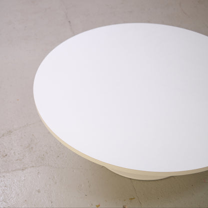 Round white MDF tabletop viewed from above