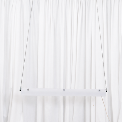 Full view of the white SLO-Metal Oy pendant light suspended from metal chains